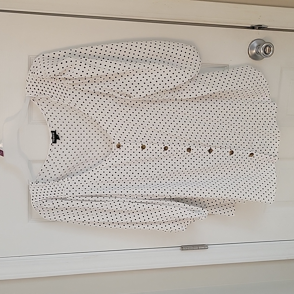 White blouse with black dots